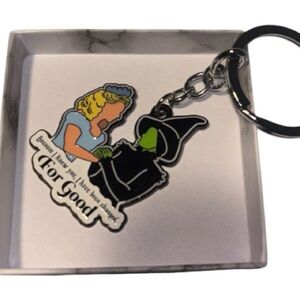 New wizards of oz Silver Keychain with Black and Green Design and quote